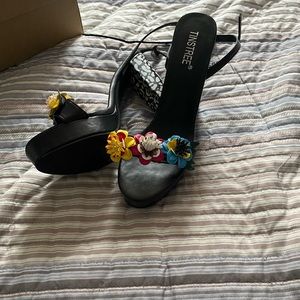 Size 9 sandals with flowers never been worn before